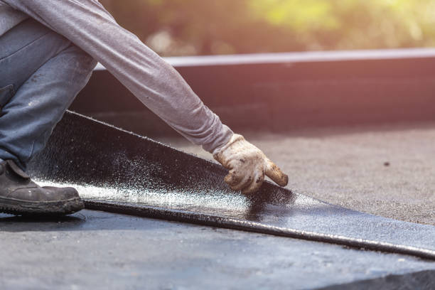 Professional Basement Waterproofing technician working in Lebanon, OR